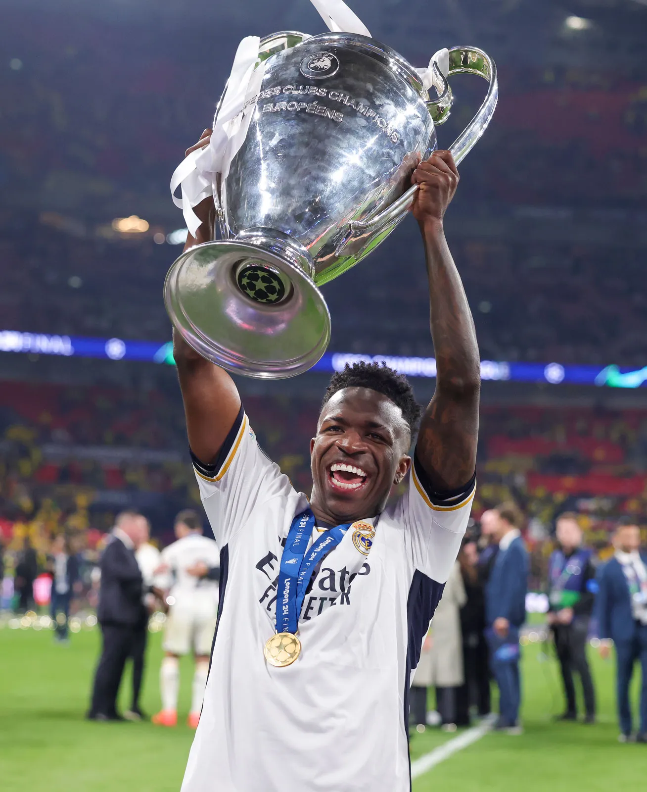 1765945793_Vinicius-Junior-Real-Madrid-football-soccer-player-UEFA-league-champion-trophy-wembly-stadium-london-2024.webp
